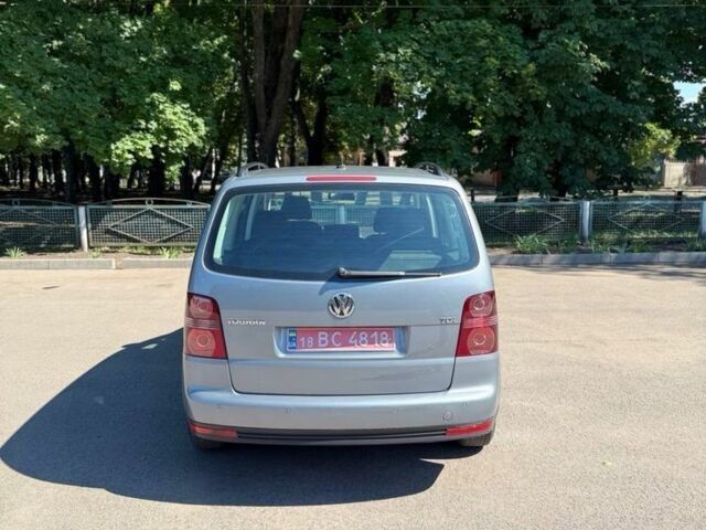 Серый Фольксваген Туран, объемом двигателя 1.9 л и пробегом 235 тыс. км за 9100 $, фото 4 на Automoto.ua