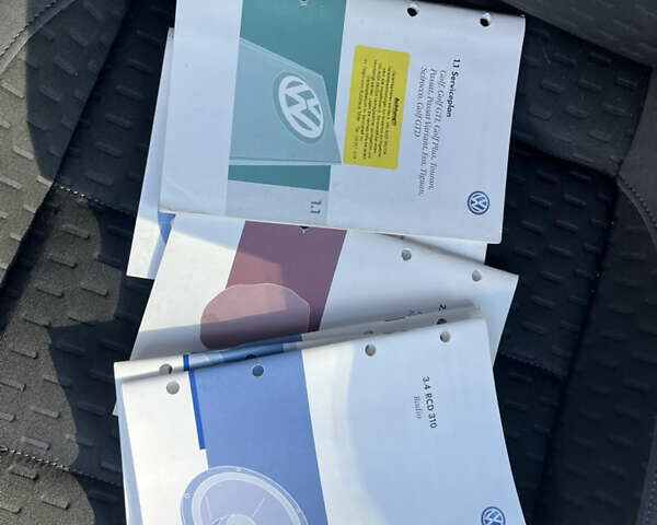 Серый Фольксваген Туран, объемом двигателя 1.4 л и пробегом 235 тыс. км за 7450 $, фото 23 на Automoto.ua