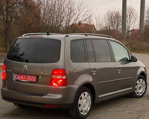 Сірий Фольксваген Туран, об'ємом двигуна 1.4 л та пробігом 174 тис. км за 6999 $, фото 4 на Automoto.ua