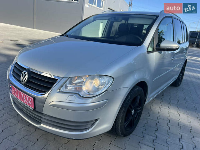 Серый Фольксваген Туран, объемом двигателя 1.4 л и пробегом 235 тыс. км за 7450 $, фото 4 на Automoto.ua