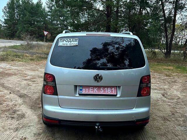 Серый Фольксваген Туран, объемом двигателя 1.4 л и пробегом 211 тыс. км за 9700 $, фото 3 на Automoto.ua