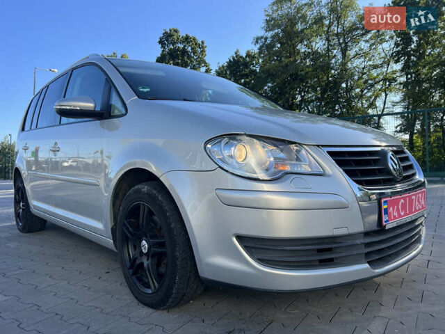 Серый Фольксваген Туран, объемом двигателя 1.4 л и пробегом 235 тыс. км за 7450 $, фото 2 на Automoto.ua