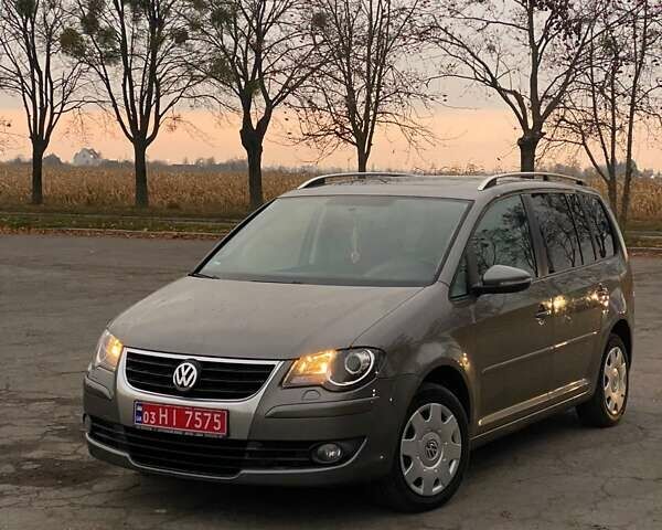 Сірий Фольксваген Туран, об'ємом двигуна 1.4 л та пробігом 174 тис. км за 6999 $, фото 1 на Automoto.ua