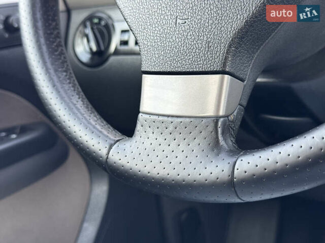 Сірий Фольксваген Туран, об'ємом двигуна 1.4 л та пробігом 197 тис. км за 7690 $, фото 46 на Automoto.ua