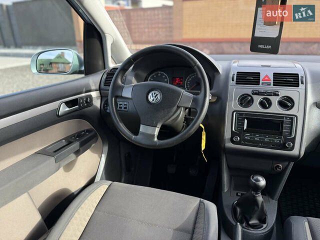 Сірий Фольксваген Туран, об'ємом двигуна 1.4 л та пробігом 197 тис. км за 7690 $, фото 37 на Automoto.ua