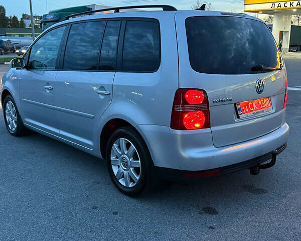 Сірий Фольксваген Туран, об'ємом двигуна 1.6 л та пробігом 212 тис. км за 8499 $, фото 54 на Automoto.ua