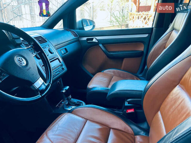 Сірий Фольксваген Туран, об'ємом двигуна 1.9 л та пробігом 200 тис. км за 8500 $, фото 31 на Automoto.ua