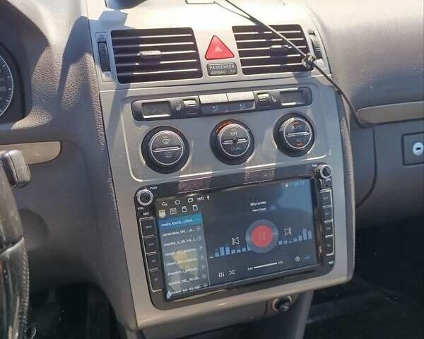 Серый Фольксваген Туран, объемом двигателя 1.9 л и пробегом 237 тыс. км за 7600 $, фото 13 на Automoto.ua