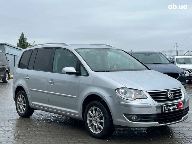 Серый Фольксваген Туран, объемом двигателя 1.4 л и пробегом 256 тыс. км за 7490 $, фото 1 на Automoto.ua