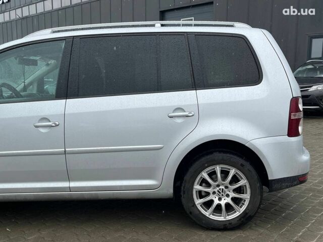 Серый Фольксваген Туран, объемом двигателя 1.4 л и пробегом 256 тыс. км за 7490 $, фото 26 на Automoto.ua