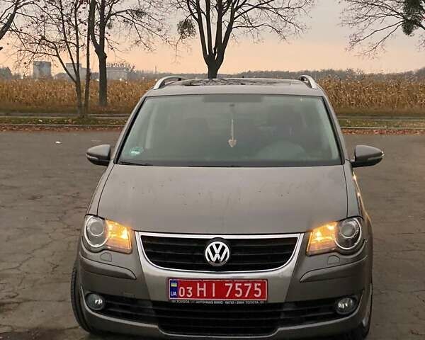 Сірий Фольксваген Туран, об'ємом двигуна 1.4 л та пробігом 174 тис. км за 6999 $, фото 2 на Automoto.ua