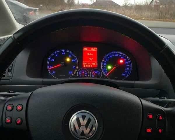 Сірий Фольксваген Туран, об'ємом двигуна 1.4 л та пробігом 174 тис. км за 6999 $, фото 15 на Automoto.ua