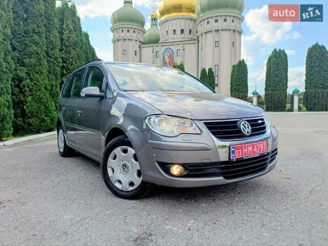 Сірий Фольксваген Туран, об'ємом двигуна 1.4 л та пробігом 159 тис. км за 7899 $, фото 4 на Automoto.ua