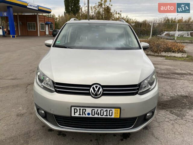 Серый Фольксваген Туран, объемом двигателя 1.39 л и пробегом 168 тыс. км за 9500 $, фото 2 на Automoto.ua