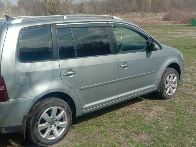 Серый Фольксваген Туран, объемом двигателя 1.4 л и пробегом 3 тыс. км за 6162 $, фото 3 на Automoto.ua