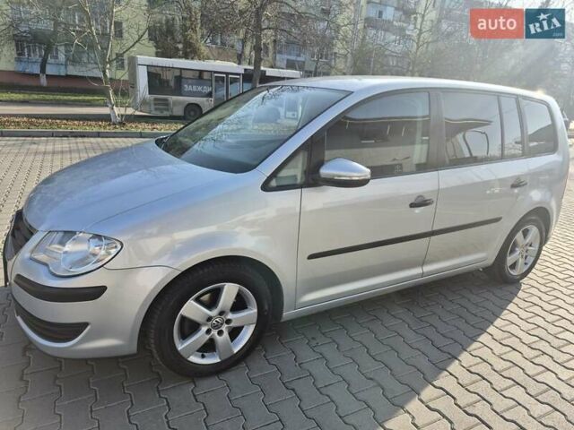 Серый Фольксваген Туран, объемом двигателя 1.9 л и пробегом 238 тыс. км за 9200 $, фото 2 на Automoto.ua