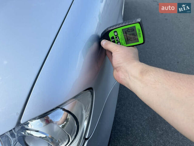 Серый Фольксваген Туран, объемом двигателя 1.4 л и пробегом 179 тыс. км за 8500 $, фото 45 на Automoto.ua