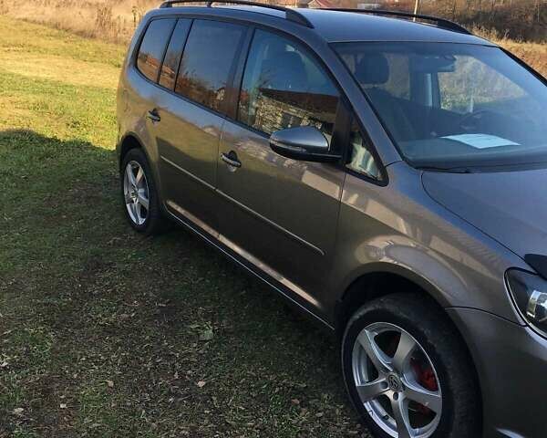 Сірий Фольксваген Туран, об'ємом двигуна 1.39 л та пробігом 333 тис. км за 7999 $, фото 4 на Automoto.ua