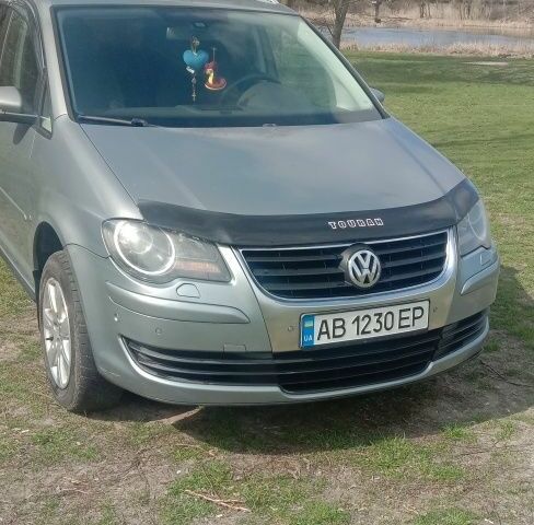 Серый Фольксваген Туран, объемом двигателя 1.4 л и пробегом 3 тыс. км за 6162 $, фото 4 на Automoto.ua