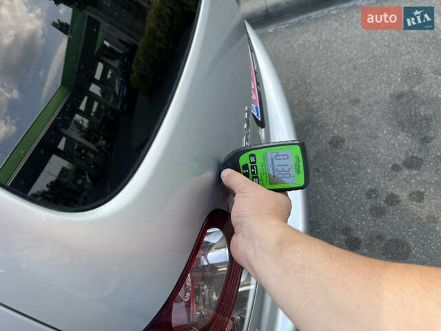 Серый Фольксваген Туран, объемом двигателя 1.4 л и пробегом 179 тыс. км за 8500 $, фото 49 на Automoto.ua