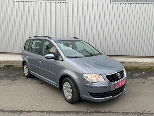 Серый Фольксваген Туран, объемом двигателя 1.4 л и пробегом 221 тыс. км за 7900 $, фото 21 на Automoto.ua