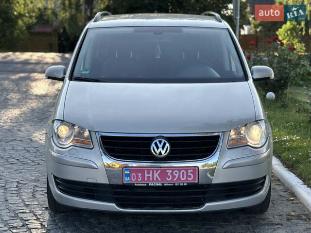 Серый Фольксваген Туран, объемом двигателя 1.4 л и пробегом 242 тыс. км за 6550 $, фото 2 на Automoto.ua