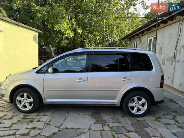 Сірий Фольксваген Туран, об'ємом двигуна 1.4 л та пробігом 238 тис. км за 7200 $, фото 1 на Automoto.ua