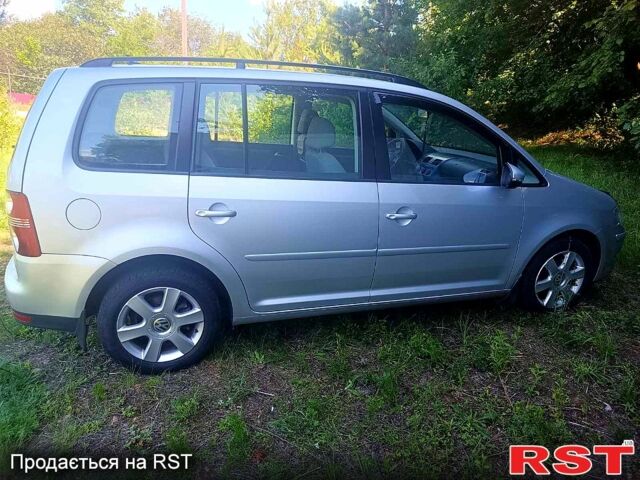 Серый Фольксваген Туран, объемом двигателя 1.4 л и пробегом 228 тыс. км за 7300 $, фото 2 на Automoto.ua