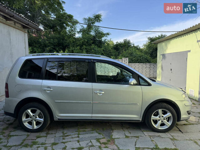 Сірий Фольксваген Туран, об'ємом двигуна 1.4 л та пробігом 238 тис. км за 7200 $, фото 2 на Automoto.ua