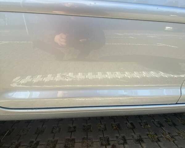 Серый Фольксваген Туран, объемом двигателя 1.6 л и пробегом 250 тыс. км за 10750 $, фото 2 на Automoto.ua