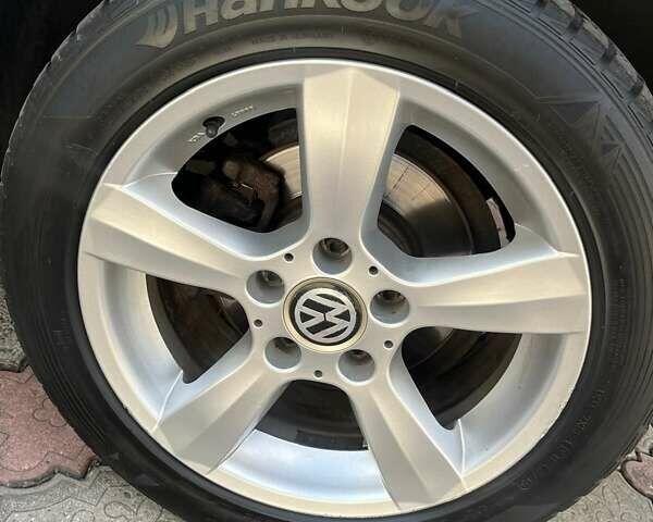 Серый Фольксваген Туран, объемом двигателя 1.39 л и пробегом 172 тыс. км за 9200 $, фото 5 на Automoto.ua