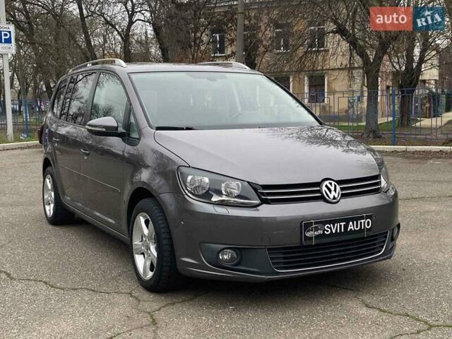 Серый Фольксваген Туран, объемом двигателя 1.39 л и пробегом 174 тыс. км за 10200 $, фото 2 на Automoto.ua