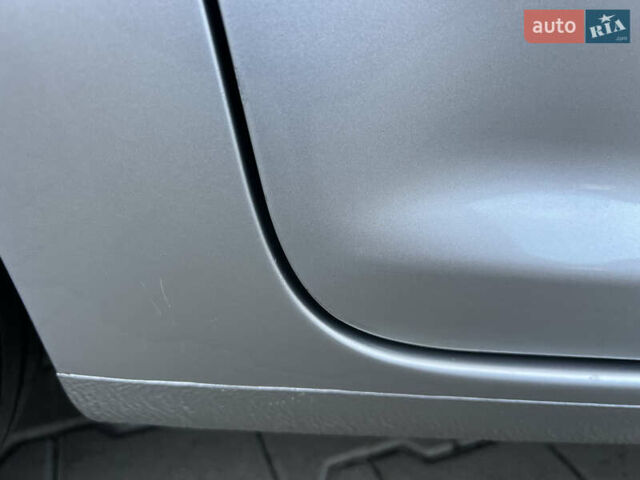 Серый Фольксваген Туран, объемом двигателя 1.4 л и пробегом 223 тыс. км за 7850 $, фото 130 на Automoto.ua