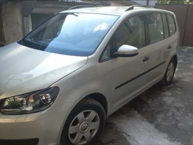 Серый Фольксваген Туран, объемом двигателя 1.4 л и пробегом 200 тыс. км за 12880 $, фото 1 на Automoto.ua