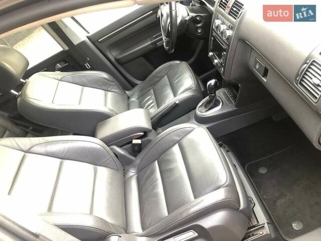 Сірий Фольксваген Туран, об'ємом двигуна 2 л та пробігом 228 тис. км за 14690 $, фото 23 на Automoto.ua