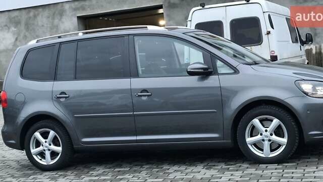 Серый Фольксваген Туран, объемом двигателя 1.4 л и пробегом 194 тыс. км за 9700 $, фото 3 на Automoto.ua