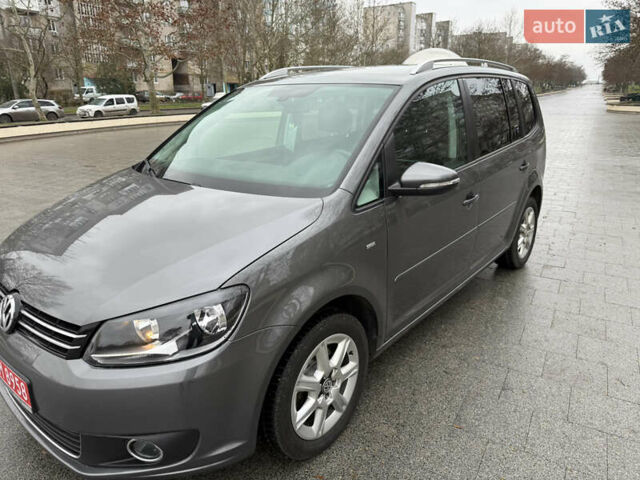 Серый Фольксваген Туран, объемом двигателя 1.6 л и пробегом 230 тыс. км за 13300 $, фото 1 на Automoto.ua