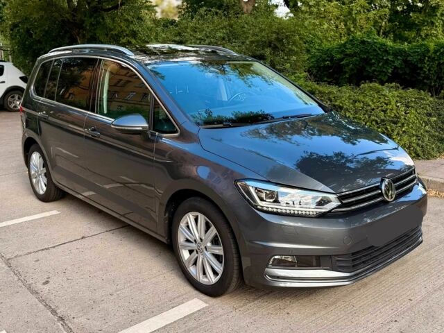 Серый Фольксваген Туран, объемом двигателя 1.5 л и пробегом 45 тыс. км за 12500 $, фото 2 на Automoto.ua