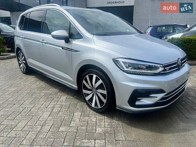 Серый Фольксваген Туран, объемом двигателя 1.5 л и пробегом 101 тыс. км за 15000 $, фото 2 на Automoto.ua