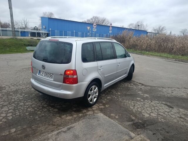 Серый Фольксваген Туран, объемом двигателя 2 л и пробегом 180 тыс. км за 2600 $, фото 2 на Automoto.ua