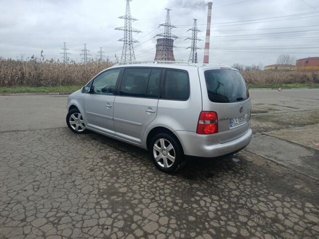 Серый Фольксваген Туран, объемом двигателя 2 л и пробегом 180 тыс. км за 2600 $, фото 3 на Automoto.ua