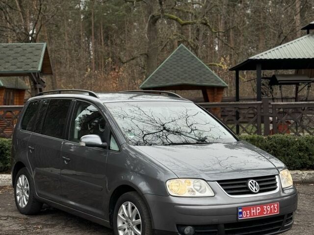 Сірий Фольксваген Туран, об'ємом двигуна 1.6 л та пробігом 200 тис. км за 5700 $, фото 1 на Automoto.ua