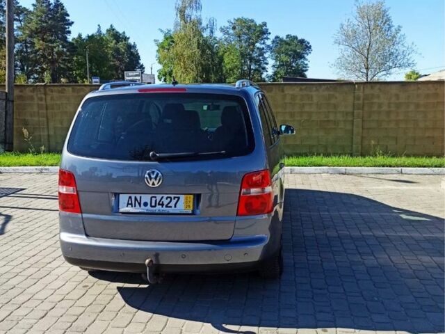 Серый Фольксваген Туран, объемом двигателя 2 л и пробегом 224 тыс. км за 3480 $, фото 2 на Automoto.ua