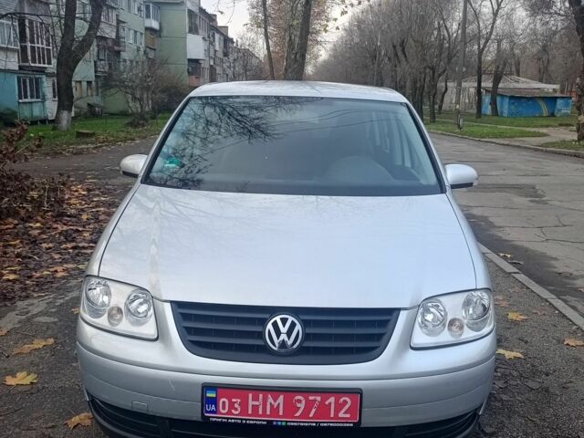 Серый Фольксваген Туран, объемом двигателя 1.6 л и пробегом 230 тыс. км за 5995 $, фото 2 на Automoto.ua