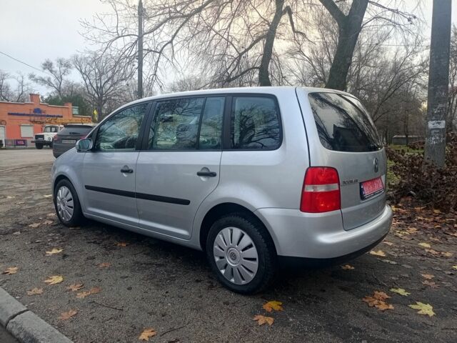 Серый Фольксваген Туран, объемом двигателя 1.6 л и пробегом 230 тыс. км за 5995 $, фото 4 на Automoto.ua