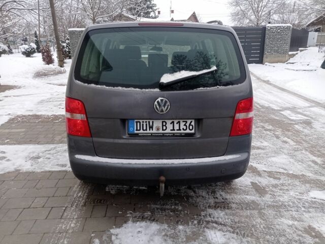 Сірий Фольксваген Туран, об'ємом двигуна 2 л та пробігом 312 тис. км за 3096 $, фото 4 на Automoto.ua