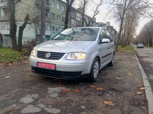 Серый Фольксваген Туран, объемом двигателя 1.6 л и пробегом 230 тыс. км за 5995 $, фото 1 на Automoto.ua