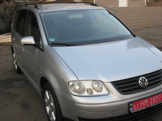 Серый Фольксваген Туран, объемом двигателя 1.6 л и пробегом 230 тыс. км за 6500 $, фото 3 на Automoto.ua