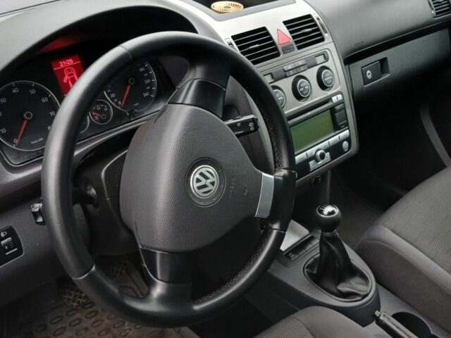 Сірий Фольксваген Туран, об'ємом двигуна 1.4 л та пробігом 295 тис. км за 5750 $, фото 2 на Automoto.ua