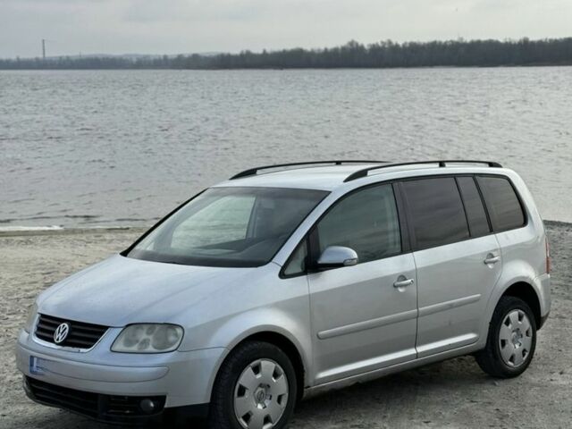 Сірий Фольксваген Туран, об'ємом двигуна 2 л та пробігом 380 тис. км за 3199 $, фото 7 на Automoto.ua